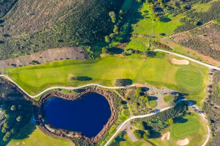 Aerial view of golf fairways and water at Castro Marim · On-site golf
