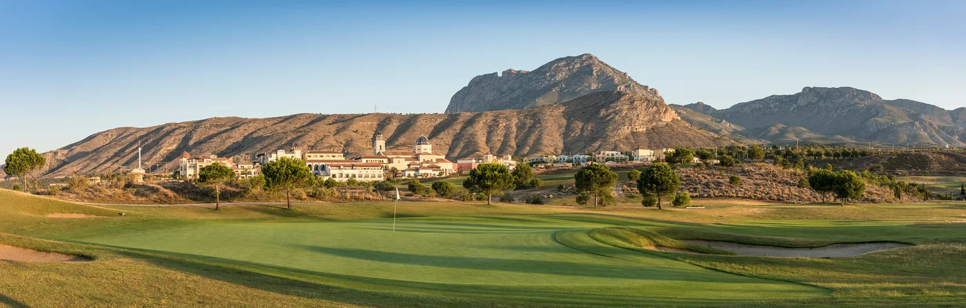 Levante Course fairway with the resort and mountains behind · On-site golf